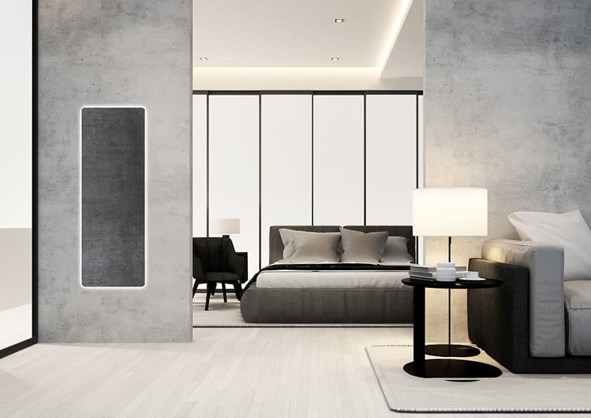 Moderner Kaminofen mit rechteckigem Sichtfenster an Betonwand in minimalistischem Schlafzimmer-Setting