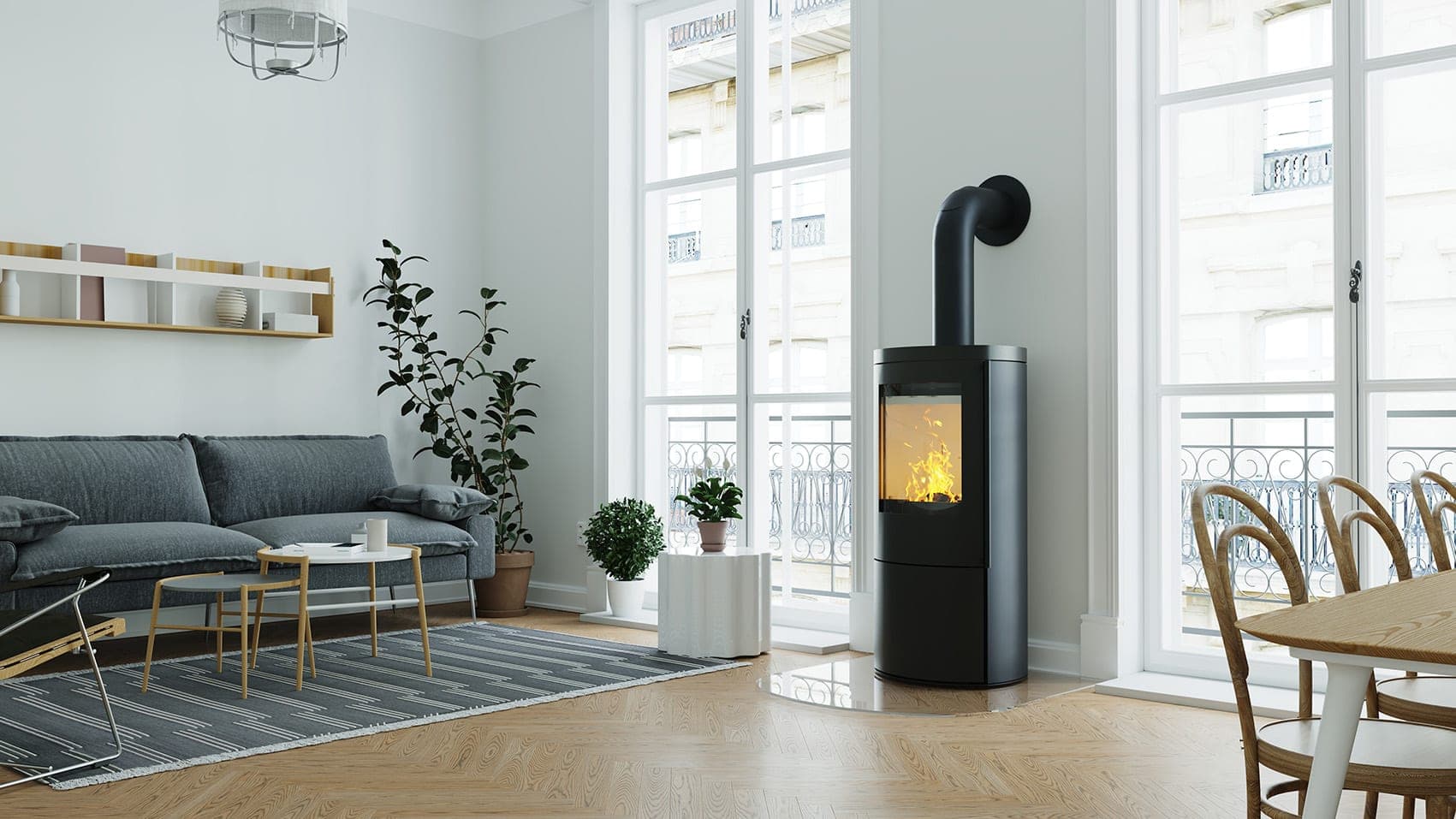 CB-tec Vaio IQ Kaminofen – Wohnzimmer mit Kamin und großer Fensterfront.