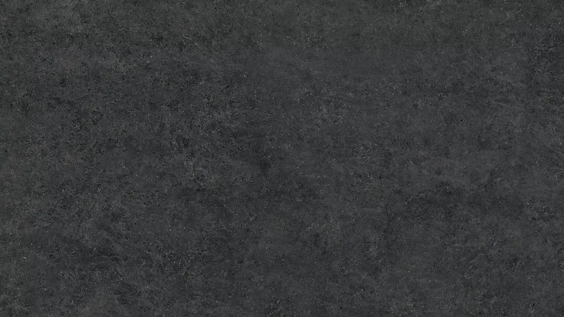 Dunkle Sinterkeramik-Oberfläche mit feiner Körnung und natürlicher Textur in Schwarz
