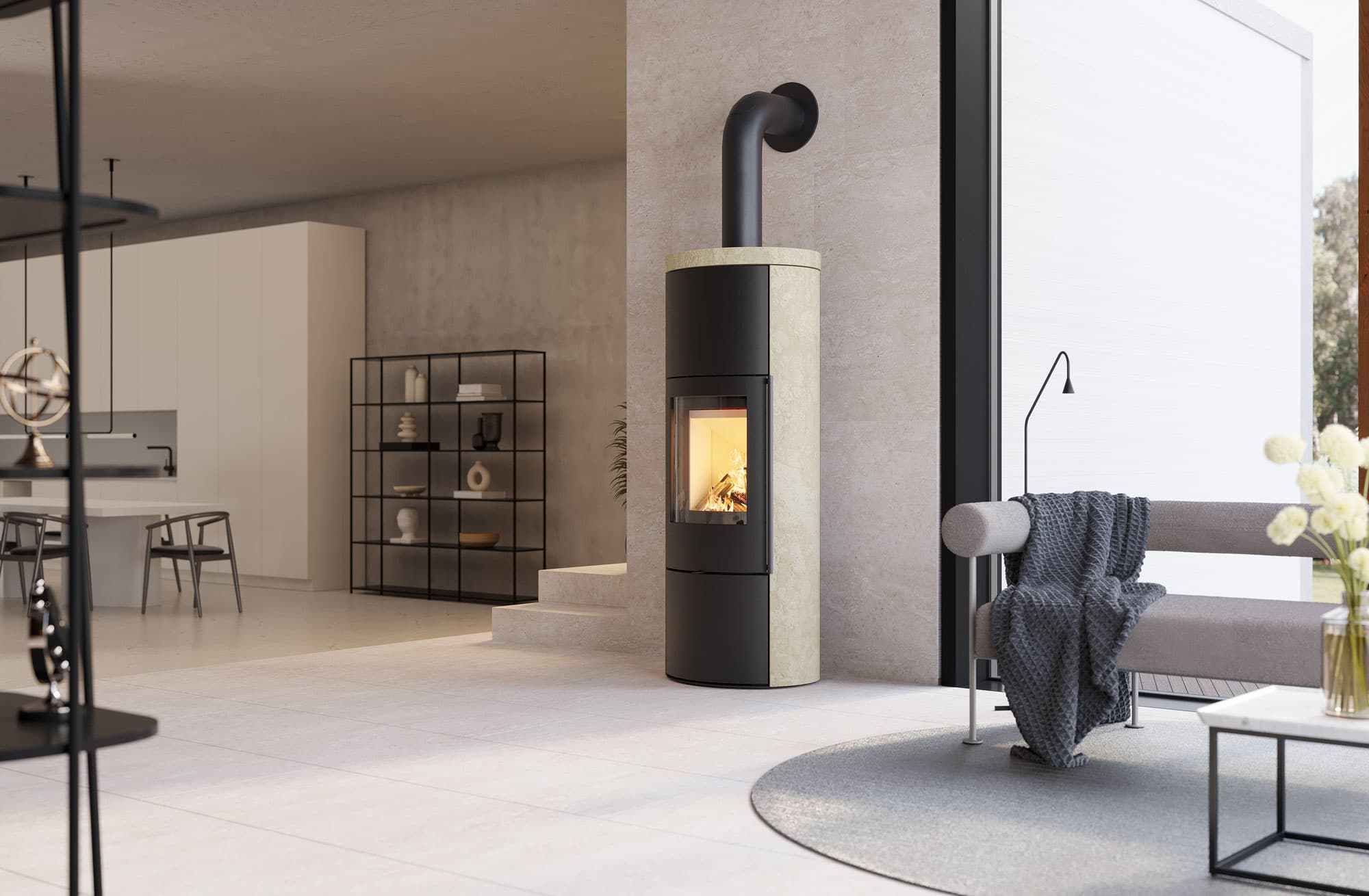 CB-tec VAIO IQ 33 XL Kaminofen mit hellem Natursteinmantel und einer Deckplatte, offener Wohnraum mit Regalwand und Sitzecke
