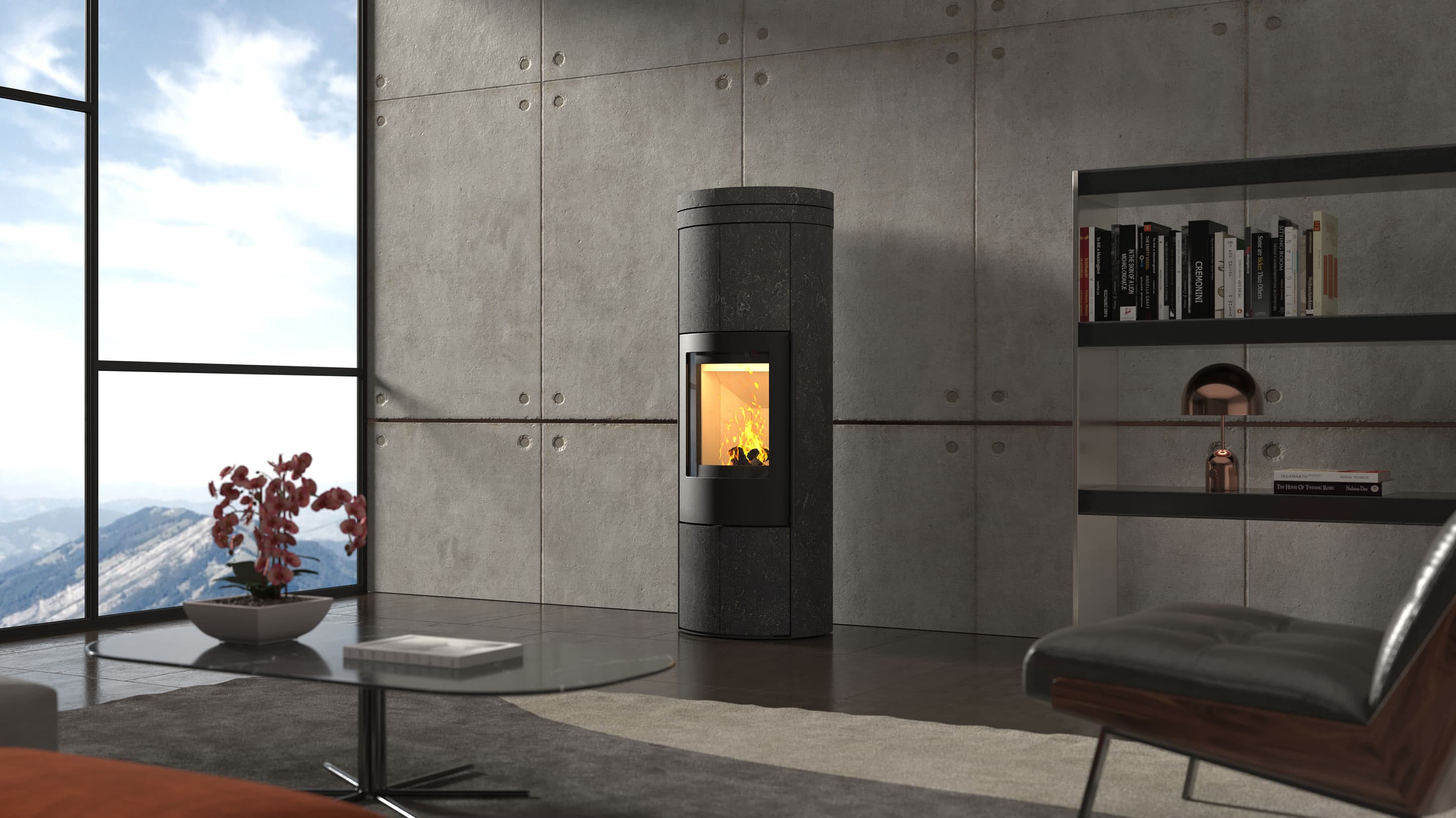 VAIO IQ 33 XL in Nero Marsala vor Sichtbetonwand mit Regal, brennendes Feuer hinter der hohen Scheibe